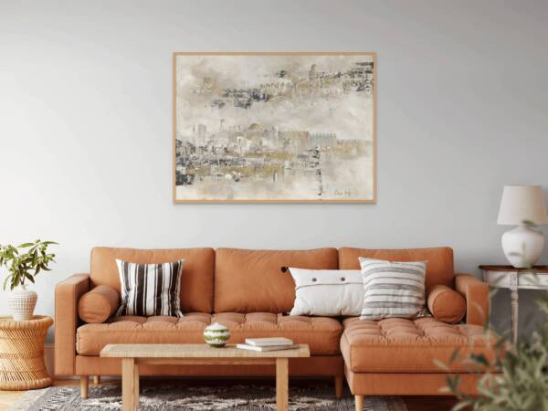Mockup of "Jerusalem Unveiled: Layers of Time and Light" painting hung above a sofa in a modern living room with minimalist design.