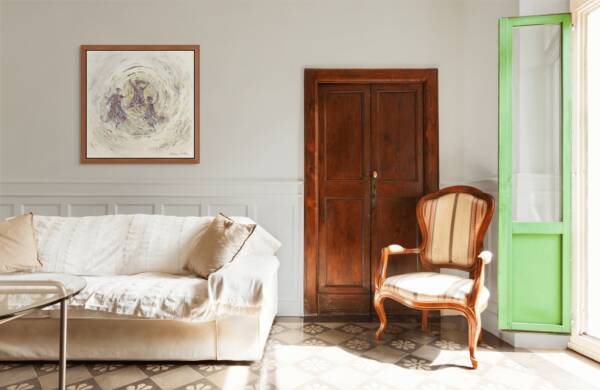 Framed artwork of three Hasidic men dancing in a golden circle, hanging above a modern white sofa beside a vintage wooden door and sunlit window.