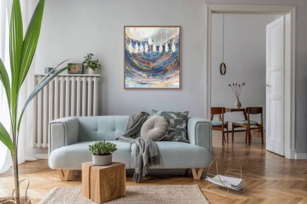 Painting of a vibrant menorah with dynamic brushstrokes hanging above a modern 3-seater sofa next to a radiator and open door in a contemporary living room.